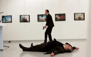 Russian Ambassador to Turkey Andrei Karlov lies on the ground after he was shot by unidentified man at an art gallery in Ankara, Turkey, December 19, 2016. Hasim Kilic/Hurriyet via REUTERS ATTENTION EDITORS - THIS PICTURE WAS PROVIDED BY A THIRD PARTY. FOR EDITORIAL USE ONLY. NO RESALES. NO ARCHIVE. TURKEY OUT. NO COMMERCIAL OR EDITORIAL SALES IN TURKEY.     TPX IMAGES OF THE DAY