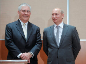FILE PHOTO - Russian Prime Minister Vladimir Putin (R) and Exxon CEO Rex Tillerson look on at a signing ceremony in the Black Sea resort of Sochi August 30, 2011. REUTERS/Alexsey Druginyn/RIA Novosti/Pool/File Photo FOR EDITORIAL USE ONLY. NOT FOR SALE FOR MARKETING OR ADVERTISING CAMPAIGNS. THIS IMAGE HAS BEEN SUPPLIED BY A THIRD PARTY. IT IS DISTRIBUTED, EXACTLY AS RECEIVED BY REUTERS, AS A SERVICE TO CLIENTS FOR EDITORIAL USE ONLY. NO RESALES. NO ARCHIVES